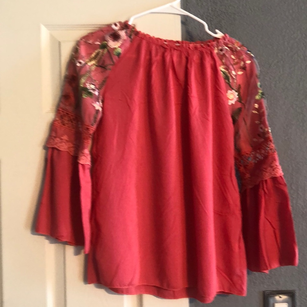 Never been worn. Watermelon top.